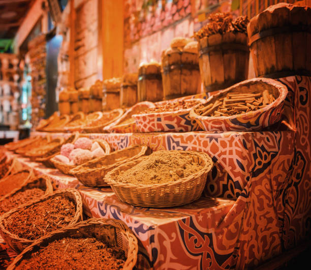 Closeup of bean mix in colorful baskets display for sale in store shop on street town village in Tuscany or Umbria during summer