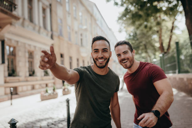 istock Two adult men enjoying visiting 8th district of Budapest 1159384030