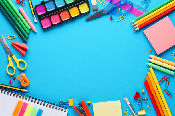 istock Various colorful stationery on blue background. Back to school. 1159384923