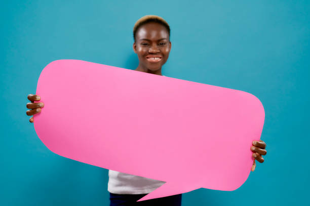 istock African woman with speech bubble with copy space for text. 1159387217