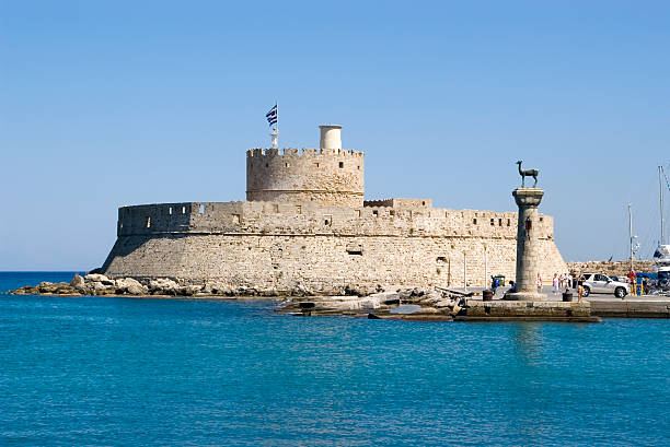 istock Harbour gates & Lighthouse St. Nicholas, Rhodes 115938889