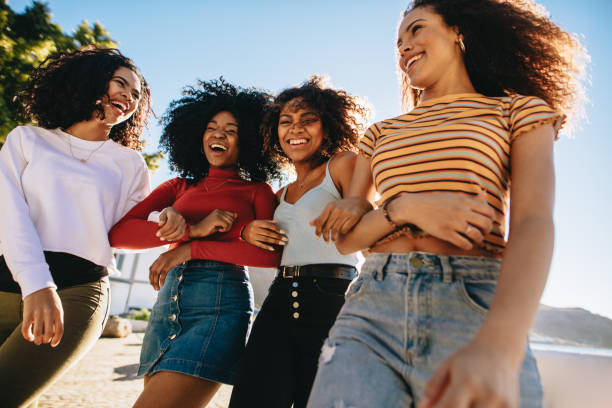 istock Friends hanging out outdoors 1159392897