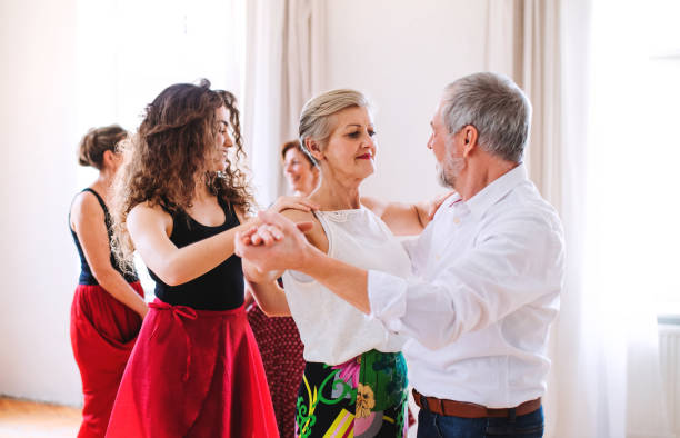 istock Group of senior people in dancing class with dance teacher. 1159393287