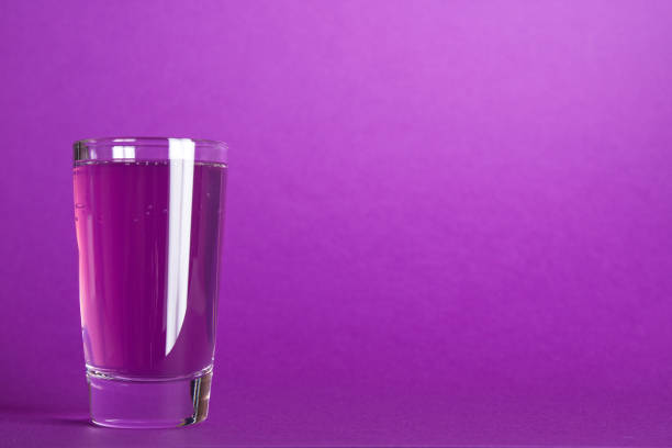 Cherry alcoholic drink in a bottle isolated on a white background. High quality photo