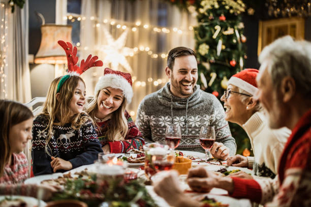 istock Family's New Year's Eve at dining table! 1159394312