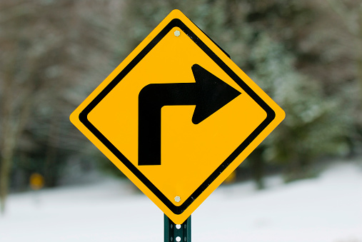 A right turn sign on a snowmobile trail in Northern Wisconsin