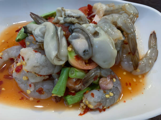 istock seafood in spicy sauce background 1159398744