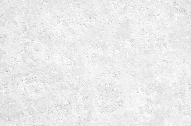 istock White grunge concrete texture. Cement stucco wall background. 1159400521