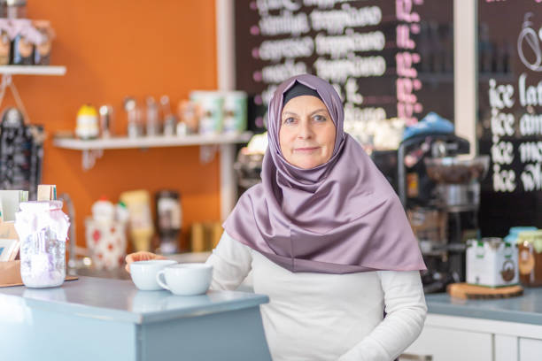 istock Muslim waiter in cafe counter 1159401521
