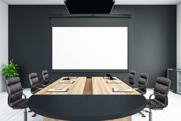 Board Room with Empty Projection Screen Modern style office with blank screen on the wall projection equipment photos stock pictures, royalty-free photos & images