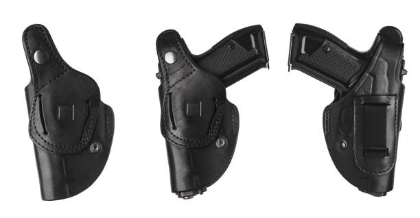 istock Black leather holster for a pistol isolated on white background 1159402169