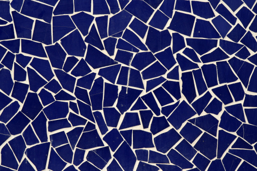 different shape tiles mosaic on wall
