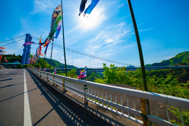istock Carp streamers at Ryujin big bridge in Ibaraki daytime sunny 1159405614