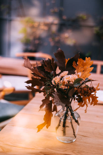 istock Autumn bouquet in a glass vase 1159406941