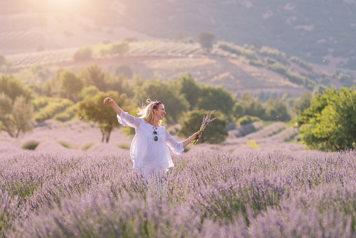 Happy woman at a lavender field