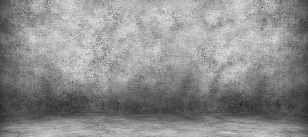 istock Grey cement wall and studio room with backdrops background. Blank product display. 1159408810