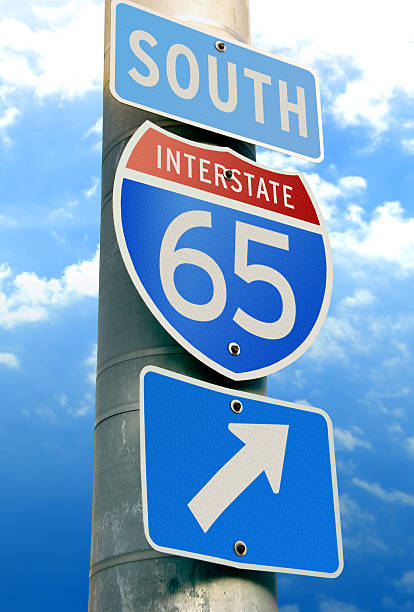 Interstate 65: Chicago, Indianapolis, Nashville, Louisville I-65 is a midwest USA interstate highway. It reaches (from North to South): Chicago, Indianapolis, Louisville, Birmingham and Montgomery, Alabama. tennessee road sign stock pictures, royalty-free photos & images