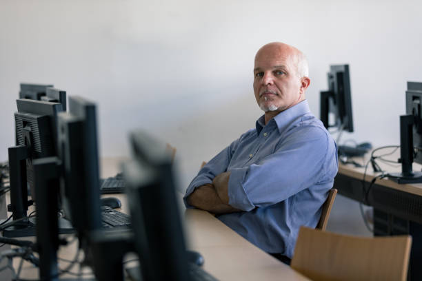 istock Thoughtful senior man in internet cafe 1159413266