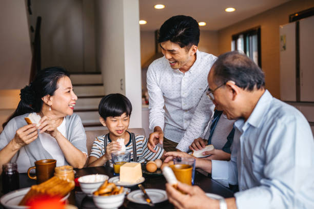 istock Family having breakfast at home 1159414644