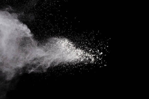 istock White powder explosion on black background. Colored cloud. Colorful dust explode. Paint Holi. 1159418034