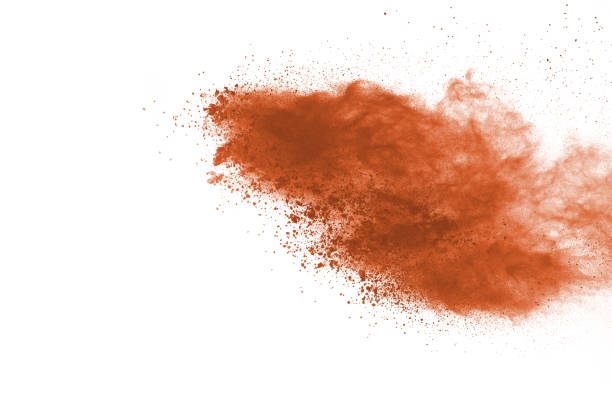 istock Brown color powder explosion on white background. Colored cloud. Colorful dust explode. Paint Holi. 1159418171