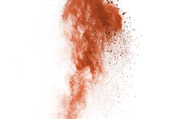 istock Brown color powder explosion on white background. Colored cloud. Colorful dust explode. Paint Holi. 1159418192