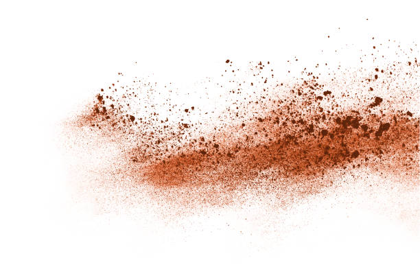 istock Brown color powder explosion on white background. Colored cloud. Colorful dust explode. Paint Holi. 1159418231