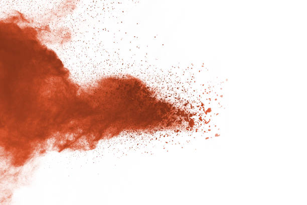 istock Brown color powder explosion on white background. Colored cloud. Colorful dust explode. Paint Holi. 1159418238