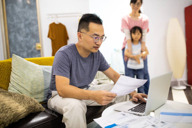 istock Overworked man doesn't have time for his family 1159419636