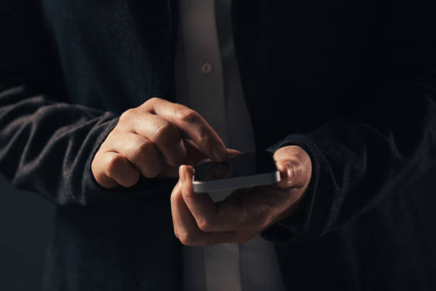 istock Close up of hands using smart phone 1159419744