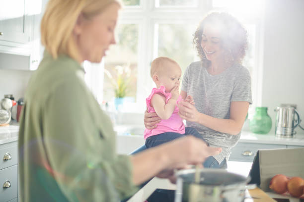 istock mealtime same sex family 1159420350