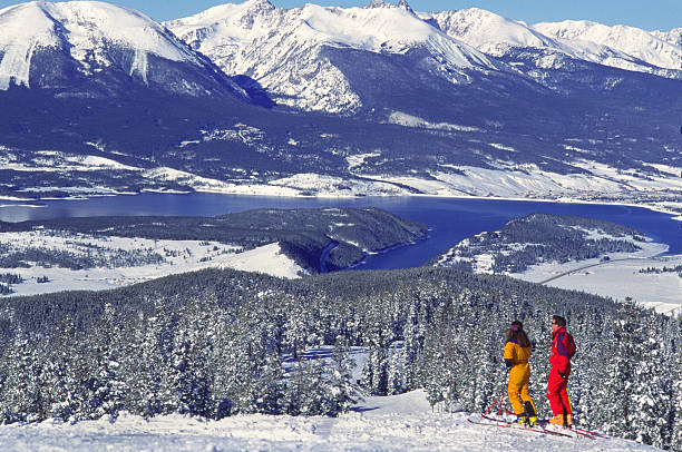 istock Couple On Ski Slopes by Mountain Lake 115942172