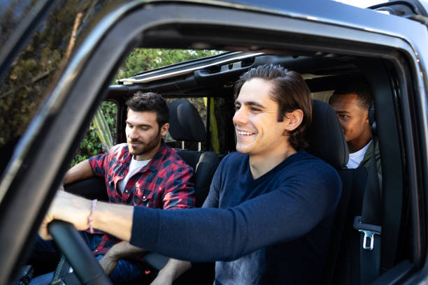 istock Friends on a road trip journey in together 1159421919