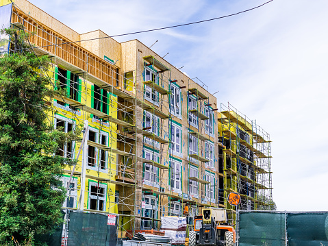 June 24, 2019 Mountain View / CA / USA - New and modern, multilevel apartment complexes are being built in Mountain View, San Francisco bay area, California