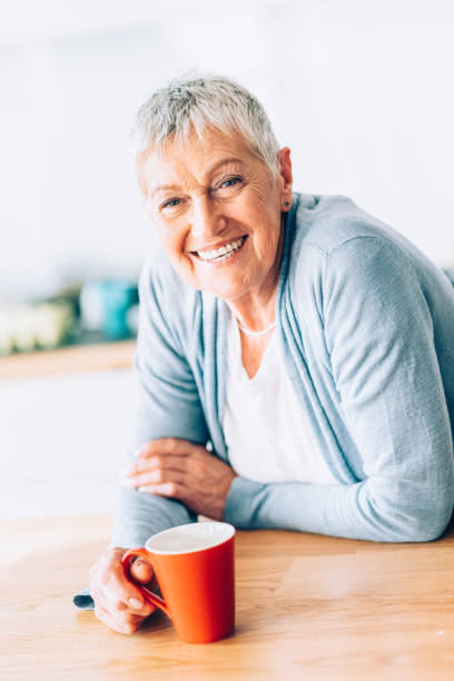 istock Happy mature woman 1159427354