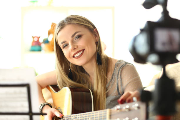 istock Happy Guitar Performer Recording Musical Vlog 1159427395