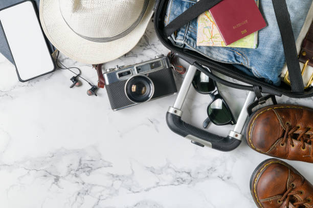 istock prepare suitcase accessories and travel items 1159429716