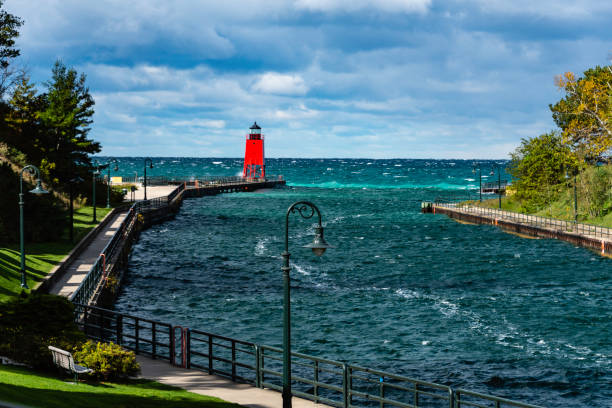 The Charlevoix South Pierhead Lighthouse against a dramatic sky.
