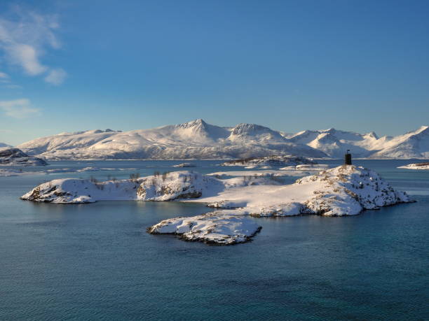 istock islands in the bay near Sommaroy 1159429800