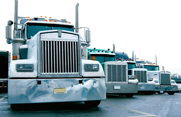 Semi Truck Convoy at a Truckstop stock photo