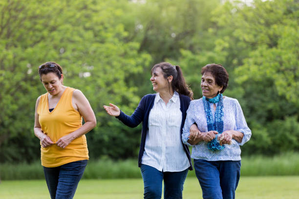 istock Three women walking in the Springtime. 1159431608