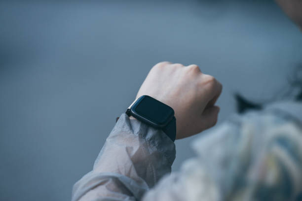 istock Woman Using Smart Watch Outdoor 1159432037
