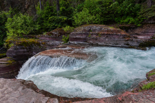 istock Top of Waterfall in Glacier 1159432099