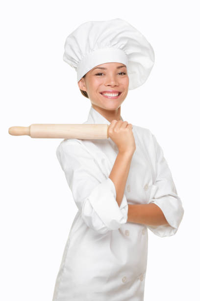 istock Baker woman smiling proud with baking rolling pin 1159433180