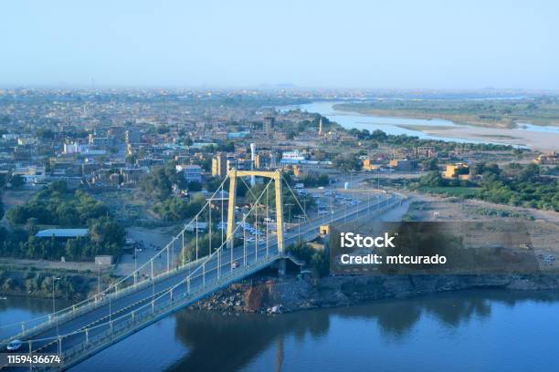 Tuti Bridge A Suspension Bridge To Tuti Island Meeting Place Of The White Nile And Blue Nile Forming The Main Nile Khartoum Sudan Stock Photo - Download Image Now
