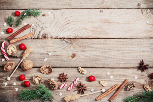 istock Christmas decorations on wooden background 1159438505