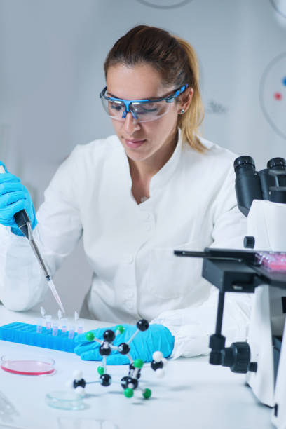 istock Female science researcher in lab 1159438526