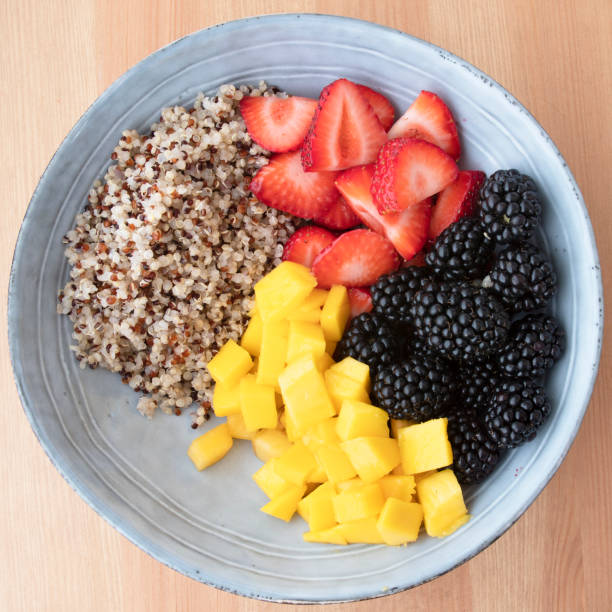 istock Blue Bowl with Quinoa and Berries 1159440450