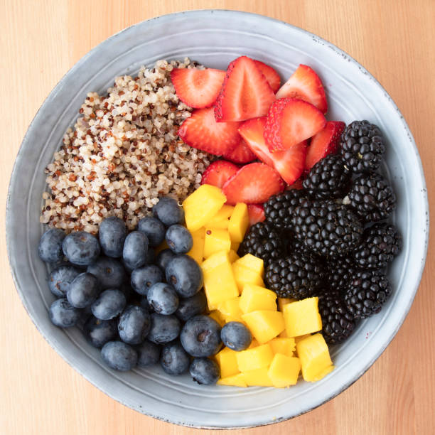 istock Blue Bowl with Quinoa and Berries 1159440508