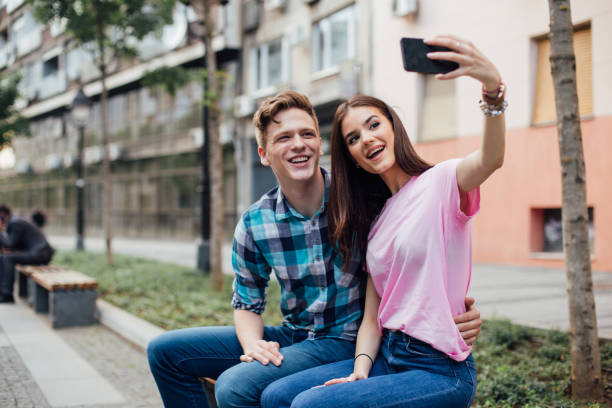 istock Happy couple taking selfie 1159440630